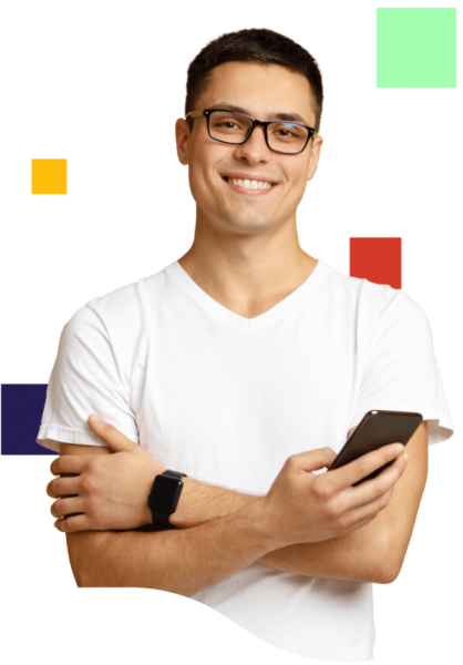 Man looking directly at you, smiling and holding a mobile phone